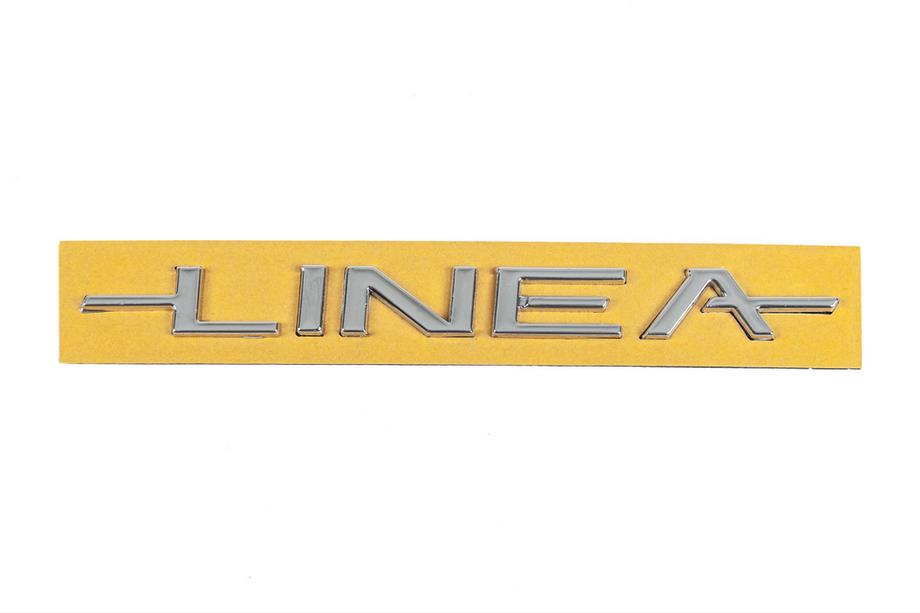Fiat Linea 2006–2018 Uzraksts Linea 51767266 (180 mm x 16 mm) Image