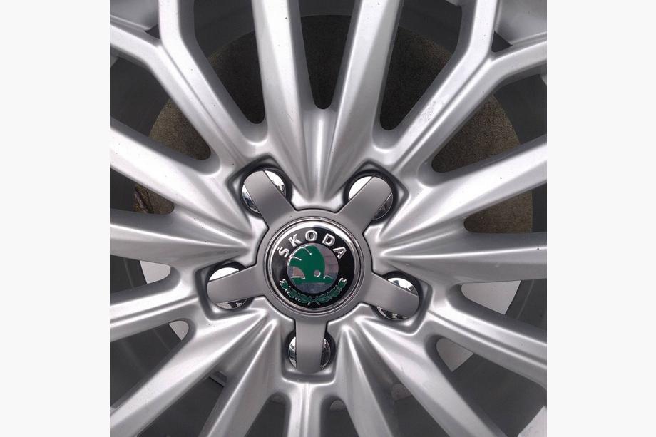 Skoda Uzlīmes disku centra vāciņiem 56 mm J1009 (4 gab.) Image