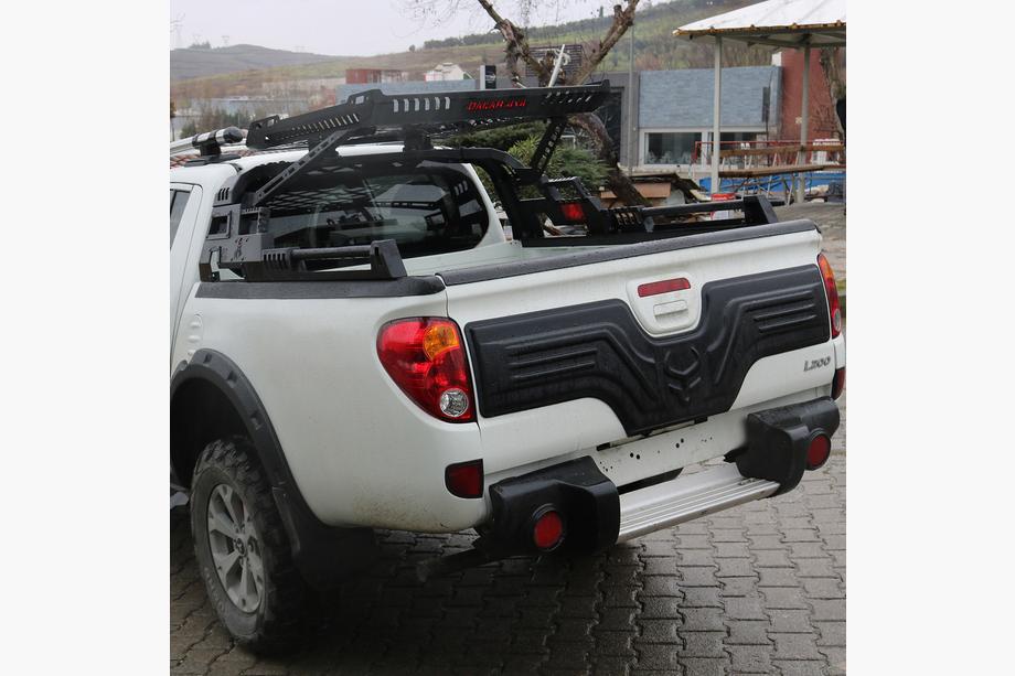 Mitsubishi L200 2006–2015 Plastmasas uzlika bagāžnieka vākam Foto 1