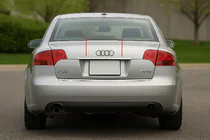 Audi A4 B7 2004–2008 Uzliktnis virs numura zīmes (Carmos, nerūsējošais tērauds) V-2 foto 1