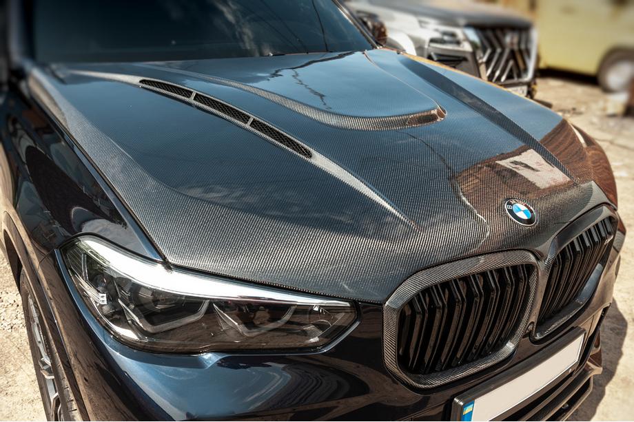 BMW X5 G05 2019–2026 Oglekļa šķiedras motora pārsegs V1 (G05/F95) Foto 1