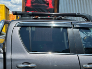 Toyota Hilux 2015– Jumta reliņi Shark (ar šķērstieni) foto 4