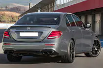 Mercedes E-klase W213 2016–2023 Aizmugurējais difuzors ar izplūdes uzgaļiem E63-Design Black (AMG/AMG-Line 2016-2020) foto 1