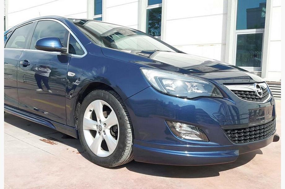 Opel Astra J 2009–2015 Priekšējā bampera lip uzlika DPT V-2 (krāsošanai) Foto 3