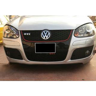 DPT V-2 priekšējā lūpa (GTI, spīdīgi melna) Volkswagen Golf 5 2003–2009 foto 1