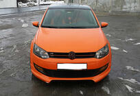 Volkswagen Polo 2010–2017 Priekšējā bampera lūpa DPT (2009-2013, melns spīdīgs) foto 1