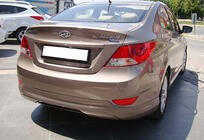 Hyundai Accent 2011–2017 Aizmugurējais difuzors DPT (spīdīgi melns) foto 3
