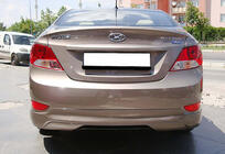 Hyundai Accent 2011–2017 Aizmugurējais difuzors DPT (spīdīgi melns) foto 1