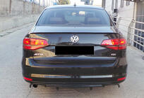 Volkswagen Jetta 2011–2018 Aizmugurējais difuzors DPT (2014-2018, spīdīgi melns) foto 1