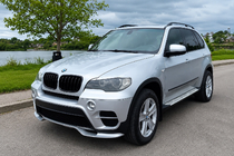 BMW X5 E70 2007–2013 Priekšējā bampera lūpa (2010-2013, krāsošanai) foto 1