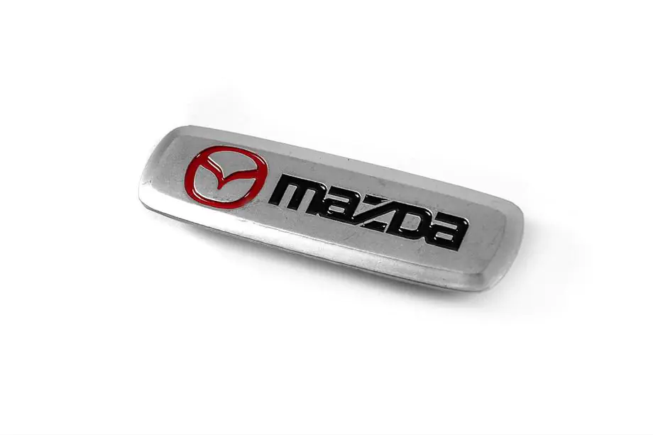 Mazda Alumīnija emblēma auto paklājiņiem (1 gab.) Image