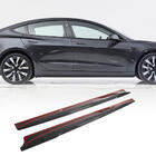 Tesla Model 3 2017– Sliekšņu uzlikas V1 (2017-2023, Carbon) foto 1