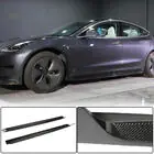 Tesla Model 3 2017– Sliekšņu uzlikas V4 (2017-2023, oglekļa šķiedra) foto 1