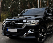 Toyota Land Cruiser 200 2007–2021 Priekšējā bampera lūpa 2016↗ (Executive 2021) Balta krāsa foto 2