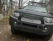 Mitsubishi L200 2006–2015 Priekšējais bamperis Dakar (2006-2010) foto 1