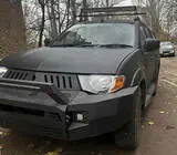 Mitsubishi L200 2006–2015 Priekšējais bamperis Dakar (2006-2010) foto 6