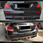 Mercedes E-klase W213 2016–2023 Aizmugurējā bufera difuzors ar izplūdes uzgaļiem V2 (AMG/AMG-Line 2016-2019, oglekļa šķiedra) foto 5