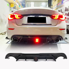 Infiniti Q50/Q60 2013–2024 V4 aizmugurējā bampera difuzors (Q50 Base/Sport 2014-2017, oglekļa šķiedra) foto 1