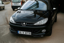 Peugeot 206 1998–2024 Priekšējā apakšējā spoilerlūpa (krāsošanai) foto 1
