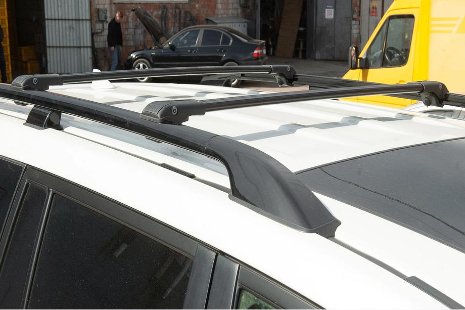 Kia Carnival 2021– Jumta bagāžnieks (šķērssijas) standarta reliņiem, slēdzams ar atslēgu WingBar V1 (2 gab.) Foto 5