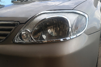 Toyota Corolla 2002–2007 Priekšējo lukturu uzlikas V1 (2002-2004, 2 gab., plastmasa) foto 1