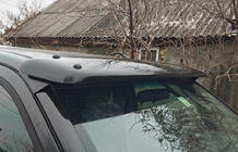 Nissan Navara 2006–2015 Saules vizieris vējstiklam (uz rāmja) foto 2