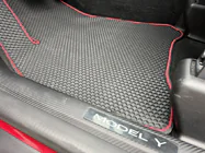 Tesla Model Y 2020– Gumijas salona paklājiņi Carsuit (2020-2024, melni) foto 16