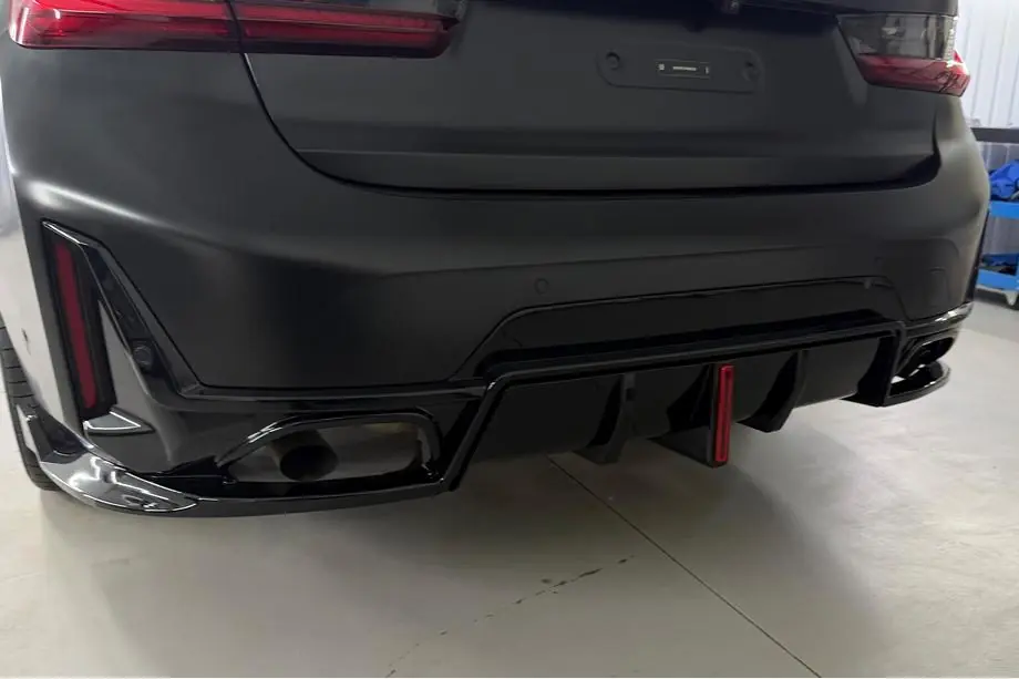 BMW 3. sērija G20/G21 2018– Aizmugurējā bufera difuzors B-Style LED (M-Sport 2023+, ABS) Image