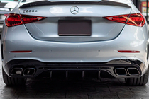 Mercedes C klase W206 2022– Aizmugurējais difuzors ar izpūtēja uzgaļiem (AMG C63 dizains) foto 1