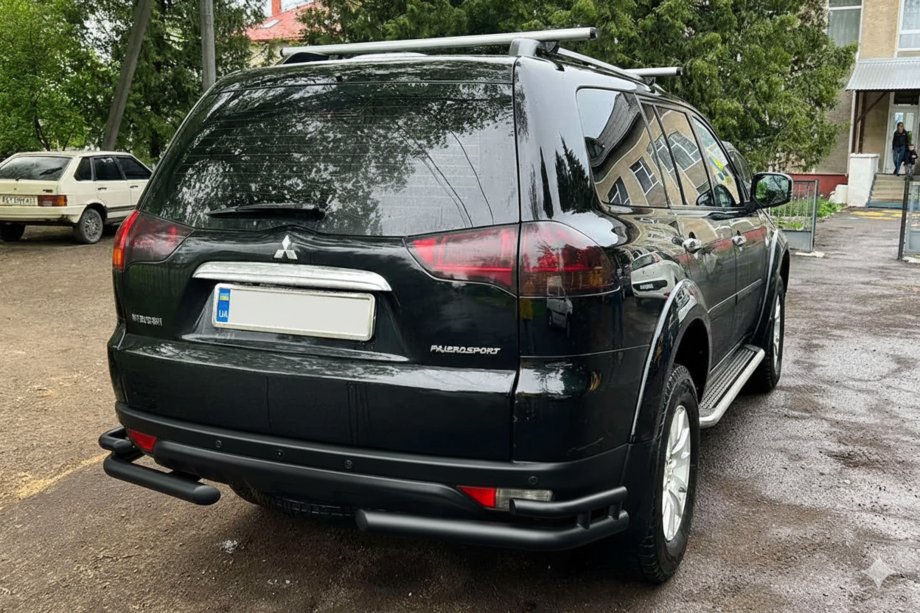 Mitsubishi Pajero Sport 2008–2015 Aizmugurējais aizsargstienis AK003-Double Black (2 gab., nerūsējošais tērauds) Foto 1