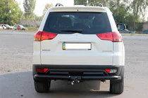 Mitsubishi Pajero Sport 2008–2015 Aizmugurējā bampera aizsargs AK003-Special Black (2 gab., nerūsējošais tērauds) foto 2