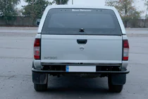 Nissan NP300 1999–2015 Aizmugures aizsargstienis AK004 Black (nerūsējošais tērauds) foto 2