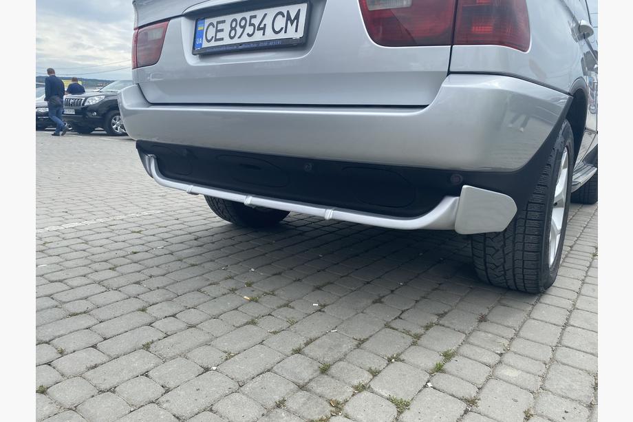 BMW X5 E53 1999–2006 Aizmugurējā bampera uzlika (krāsošanai) Image