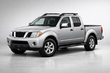 Nissan Navara 2006-2015 apskats: pikaps darbam un labam izskatam foto 1