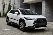 Toyota Corolla Cross 2020– Integrētie jumta reliņi, melni OEM (ABS plastmasa, uzstādīšana ar līmi) foto 3