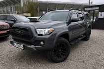 Toyota Tacoma 2015–2023 Melni OEM jumta reliņi (alumīnijs) foto 1