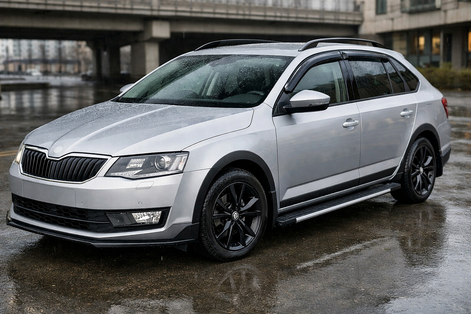Sākuma uzlabojums Skoda Octavia A7: pilsēta, lietus un tīri sliekšņi