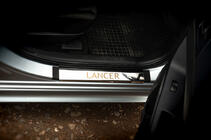 Mitsubishi Lancer X 2008– Sliekšņu uzlikas (Carmos, 4 gab., nerūsējošais tērauds) foto 1
