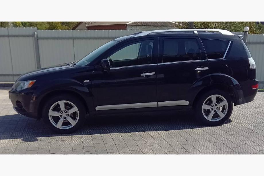Mitsubishi Outlander 2006–2012 Logu apmales (8 gab., nerūsējošais tērauds) Image