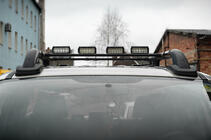 Volkswagen Amarok 2010–2022 Jumta reliņi Black Shark (ar šķērssijām) foto 4