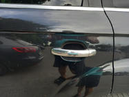 Audi Q7 2005–2015 Durvju rokturu uzlikas (4 gab., nerūsējošais tērauds) Carmos, ar pogu foto 2