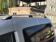 Volkswagen Caddy 2015–2020 Jumta reliņi Skyport GREY Standarta bāze foto 3