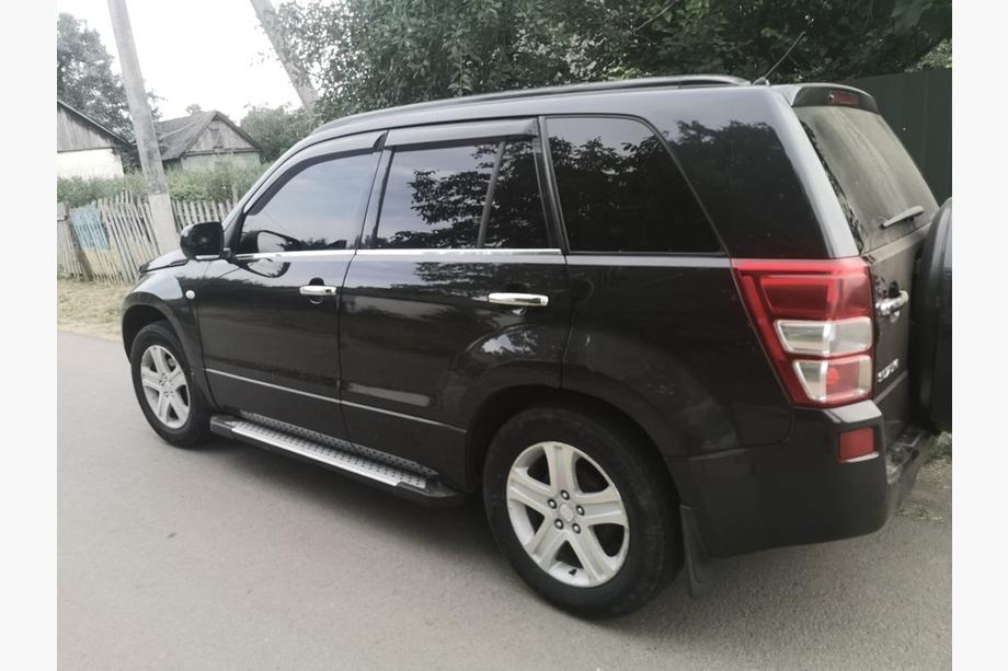 Suzuki Grand Vitara 2005–2017 Logu apmales (4 gab., nerūsējošais tērauds) Image