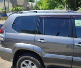 Toyota Land Cruiser Prado 120 2002–2009 Hromēti turku jumta reliņi Plastmasas stiprinājuma kājas foto 1