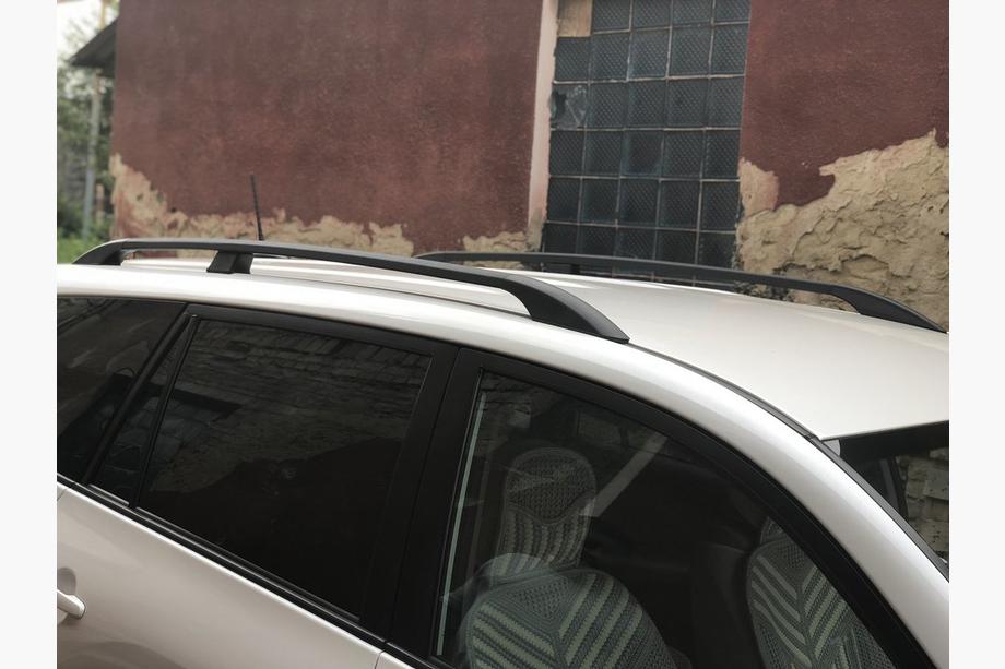 Toyota Rav 4 2006–2013 Melni turku jumta reliņi Garā bāze, plastmasas balsti Foto 5