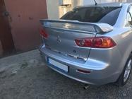 Mitsubishi Lancer X 2008– Bagāžnieka malas uzlika (nerūsējošais tērauds) Carmos - turku teras foto 2