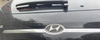 Hyundai Tucson JM 2004– Emblēma (pašlīmējoša uzlīme, 125 mm (65 mm)) foto 2