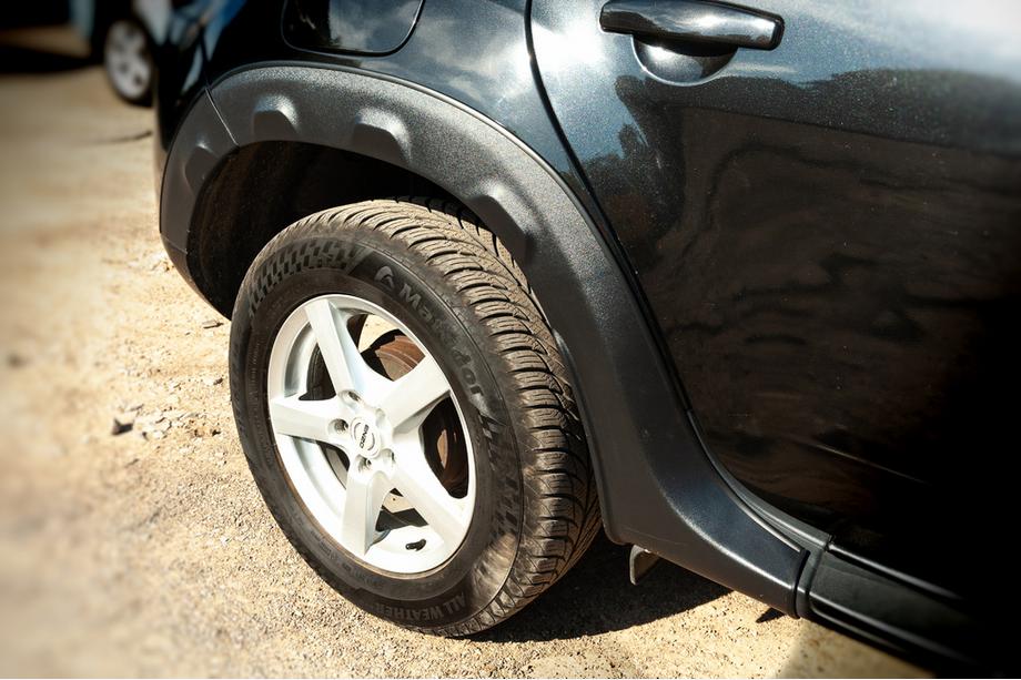 Dacia Duster 2008–2018 Riteņu arku uzlikas ar izciļņiem (8 gab., plastmasa) Image