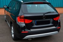 BMW X1 E84 2009–2015 OmsaLine aizmugurējā bampera uzlika (nerūsējošais tērauds) foto 2