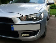 Mitsubishi Lancer X 2008– Numura zīmes turētājs (plastmasa) Spīdīgi melns foto 2
